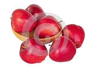 Three red apples on a white background and three in a wooden bowl. Healthy food. Apple isolate