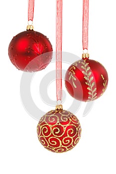 Three red baubles