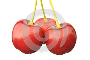 Three red cherries