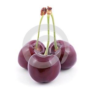 Three red cherries