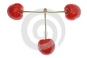 Three red cherries