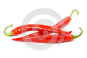Three red chilly peppers