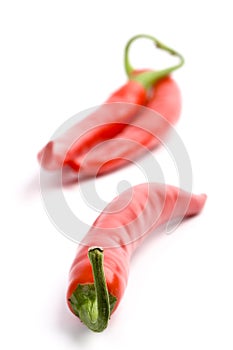 Three red chilly peppers