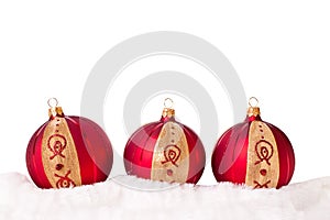 Three red christmas balls