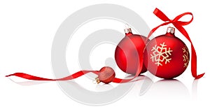 Three red Christmas baubles with ribbon bow isolated on white background