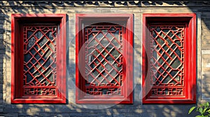 Three Red Framed Windows In A Gray Brick Wall