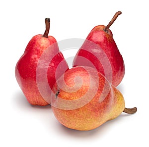 Three red ripe pears on white background.