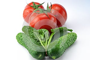 Three red ripe tomatoes
