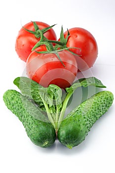 Three red ripe tomatoes