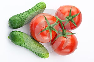 Three red ripe tomatoes