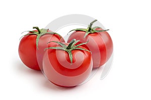 Three red tomatoes.