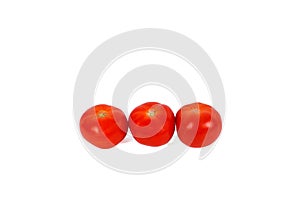 Three red tomatos