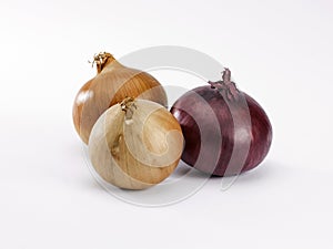 Three red and white onions