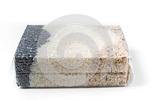 Three rice in a plastic vacuum bag