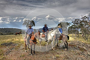 Three riders rider on a mountain