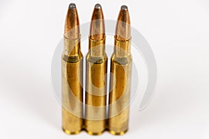 Three rifle bullets close up