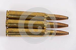 Three rifle bullets close up