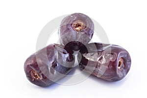 Three Ripe Dates Fruit Isolated on White