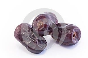 Three Ripe Dates Fruit Isolated on White