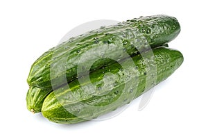 Three ripe green cucumber in stack isolated on white background