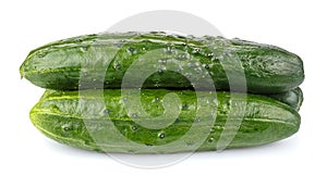 Three ripe green cucumber in stack isolated on white background
