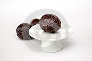 Three ripe maracujas passion fruits on a white background