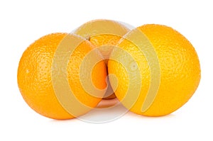 Three ripe oranges isolated on white