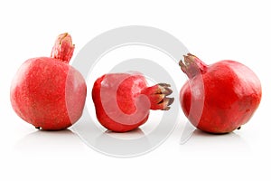 Three Ripe Pomegranates Fruits in Raw Isolated