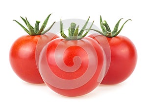 Three ripe red tomatoes isolated on white background. Cherry tomatoes