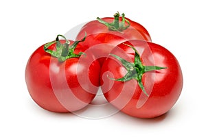 Three ripe tomatoes isolated on white background