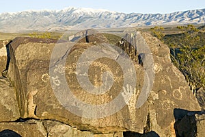 Three Rivers Petroglyph National Site, a (BLM) Bureau of Land Management Site, features an image of a hand, one of more than