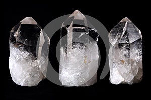 Three rock quartz crystals photo