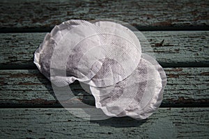 Rounds teabags on rustic table