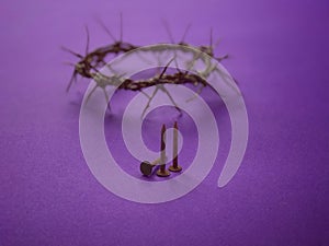 Three rusty nails and a woven crown of thorns