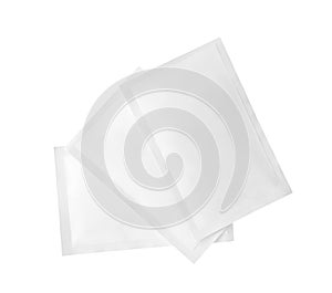 Three sachets on white background. Single use package