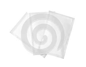 Three sachets on white background. Single use package