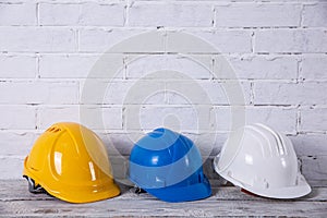 Three safety helmets are necessary for any job at the construction site. Safety and caution in protecting health and life can