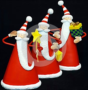 Three santa claus