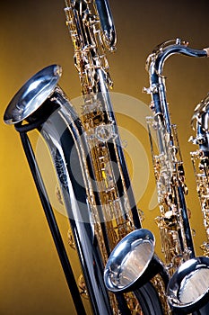 Three Saxophones on Yellow