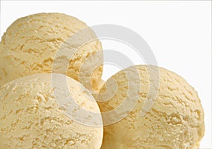 Three scoops of vanilla ice cream