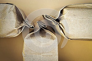 Three sealed paper bags