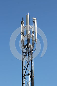 Three-sector mobile telephone base station on lattice girder tower photo