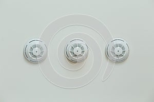 Three Sensor fire smoke alarm detectors photo