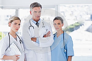 Three serious doctors