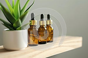 Three serum bottles in middle with plant on shelf generated by AI.