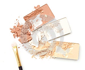 Three shade colors of make-up powder on white background