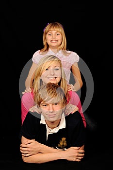 Three siblings posing