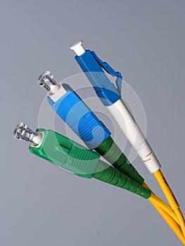 Three single fiber optic connectors