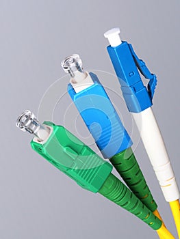 Three single fiber optic connectors
