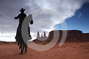 Three Sisters Monument With Cowboy Silhouette